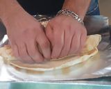 A picture of step 3 of Hummus Tikka Wrap.