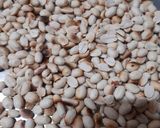 A picture of step 1 of White til and groundnut ladoo.