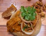 A picture of step 8 of Butter Chicken Bunny Chow.