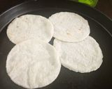 A picture of step 10 of Pathiri (Rice flour Roti) with chana.
