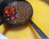 A picture of step 5 of Daal Chawal with fry Fish.