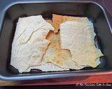 Foto del passaggio 5 della ricetta Lasagne di pane carasau con ragù di pollo e crescenza di capra