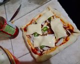 A picture of step 18 of Chicken tikka pizza (without oven bake in pateela).