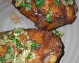 A picture of step 7 of Chicken garnished with butter and garlic😋.