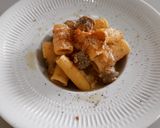 A picture of step 6 of Rigatoni with Butifarra in Roasted Garlic and Tahini Sauce.