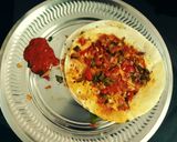 A picture of step 4 of Schezwan Uttapam.