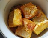 A picture of step 2 of FISH IN ORANGE fruit.
