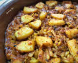 Foto del paso 7 de la receta: Arroz al horno con pota y hueva de atún
