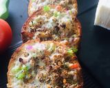 A picture of step 4 of Cheese garlic bread sandwich.