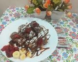 A picture of step 6 of Nutella banana Swiss rolls.