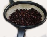 A picture of step 1 of Mexican Enchilada With black bean, cheese, black olives and etc. Stuffing.