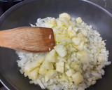Foto del paso 6 de la receta: Calabacín relleno con cebolla y mijo