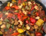 A picture of step 5 of Greek peppers and sausage bake with feta.
