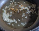 A picture of step 2 of Pumpkin Flowers Fried Rice.