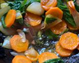 A picture of step 2 of Winter Herbal Chicken Spinach Soup.