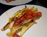 Foto del paso 3 de la receta Lubina al horno con tomates cherry, patatas y cebolla