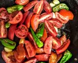 A picture of step 3 of Indian style tomato chutney.