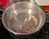 A picture of step 4 of Stir fried greens with herbs.