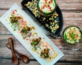 A picture of step 9 of Holi special Dahi Bhalle with Smokey effect.
