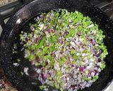 Foto del paso 11 de la receta Arroz bomba caldoso de pulpitos y tiras de piquillo