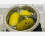 A picture of step 1 of Aam Ka Khatta Meetha Pana.