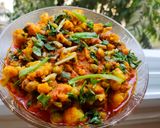 A picture of step 10 of Gobhi Matar Masala.