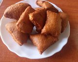 A picture of step 7 of Crunchy coconut Mandazi.