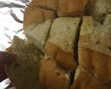A picture of step 3 of Pull apart garlic cheesy bread.