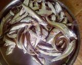A picture of step 1 of Sorshe Hilsha Maach Curry.