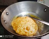 A picture of step 5 of Masala poori with white chana.