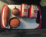 A picture of step 1 of Tomato & lentil sauce for babies and adults.