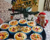 A picture of step 7 of Christmas special vanilla tutti fruti cup cakes.