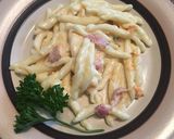 A picture of step 6 of Bacon and three cheese carbonara with strozzapreti pasta.