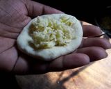A picture of step 4 of Cheesy kulcha on tawa.