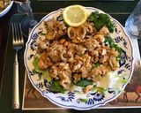A picture of step 6 of 675. California Farm Fried Calamari Cashew Salad.