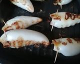 Foto del passaggio 6 della ricetta Calamari ripieni di melanzane su letto di pomodorini