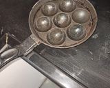 A picture of step 11 of Rava appe.