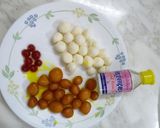 A picture of step 3 of Gulabjamun kulfi.