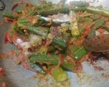 A picture of step 5 of Masaledar Bhindi.