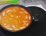 Foto del paso 4 de la receta: Salchichas con arroz