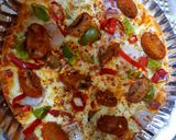 A picture of step 3 of Mushroom pizza.