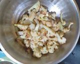 A picture of step 1 of Gobhi matar Aloo.
