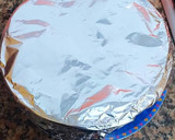 Foto del paso 14 de la receta: Tarta de queso, limón y vainilla con glaseado de pasas al ron