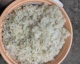 A picture of step 4 of Cumin Rice.