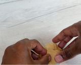 A picture of step 9 of Coconut Sesame Seeds Dinner Rolls.