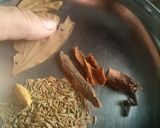 A picture of step 2 of Aloo chane ki tahiri.