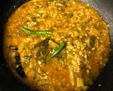 A picture of step 8 of Pui Shake Diye Bhaja Muger Dal (Roasted Moong Dal Cooked With Malabar Spinach - Bong Style).