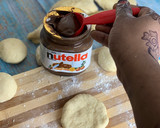 A picture of step 4 of NUTELLA FILLED BREAD 🥯.