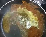 A picture of step 6 of Egg samosa with gravy.