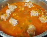 Foto del paso 4 de la receta: Arroz meloso con butifarras y chorizo
